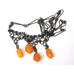 Amber necklace with metal finish