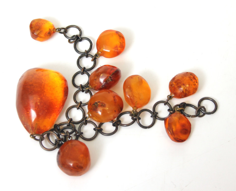 Amber pendant with metal