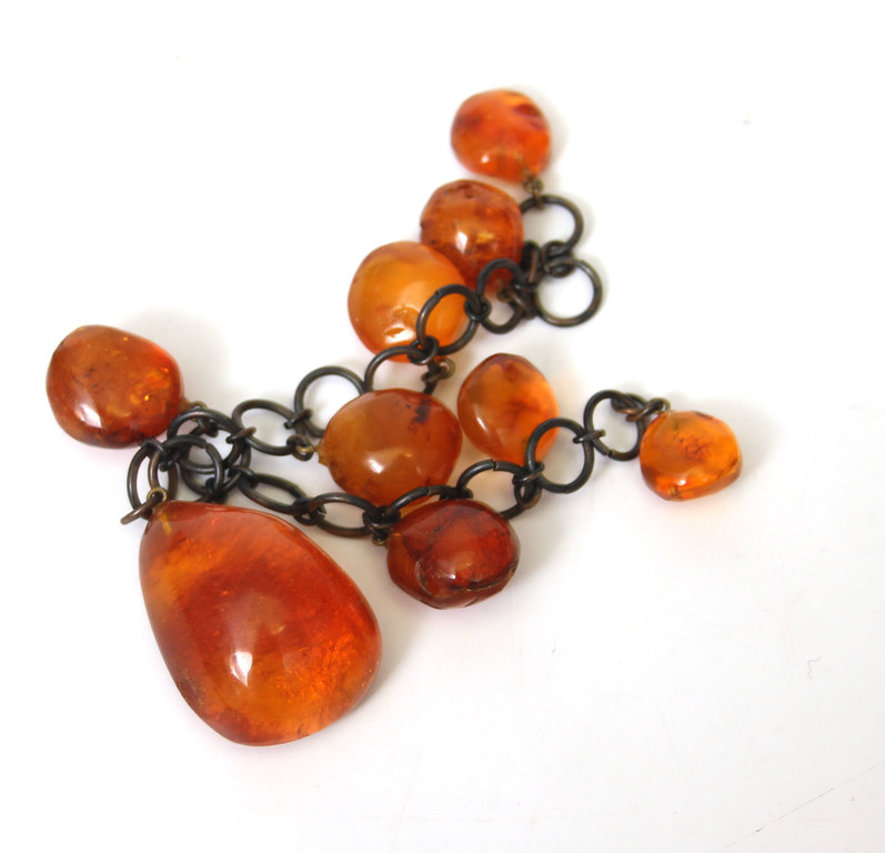 Amber pendant with metal