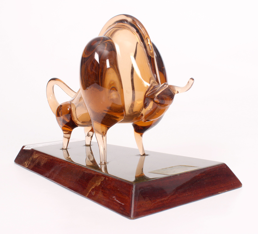 Glass figure on a wooden base 