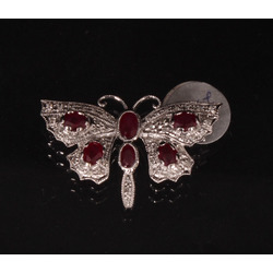 White gold brooch with rubies and diamonds