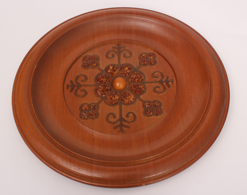 Wooden plate with amber