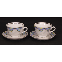 Two porcelain cups with saucers