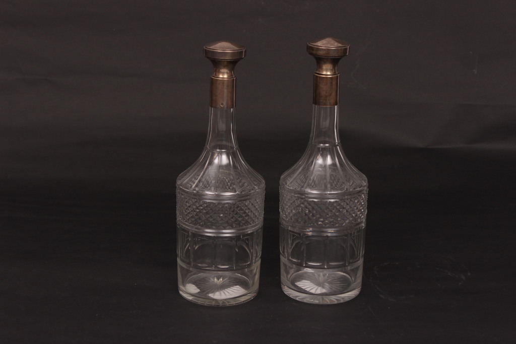 Two glass decanters with silver finish