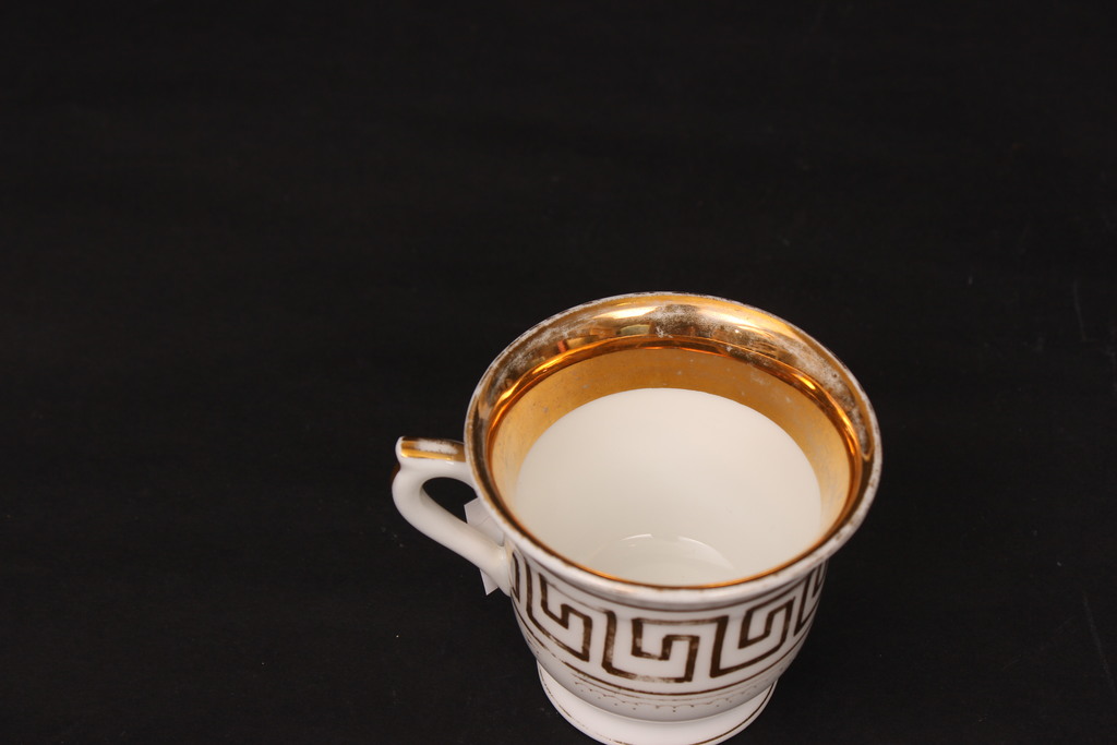 Porcelain cup with gilding