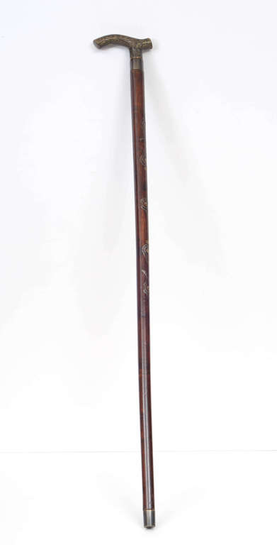 Stand with bronze handle