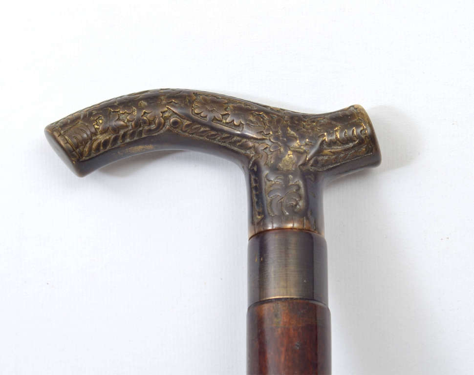 Stand with bronze handle