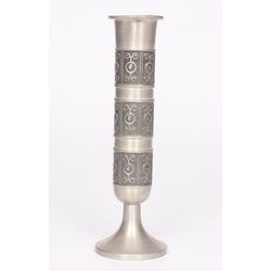 Metal vase with ornaments
