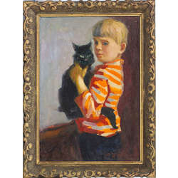 A boy with a cat