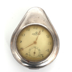 Серебряные карманные часы в металлической оправе 