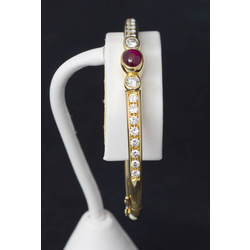 Gold bracelet with diamonds and rubies