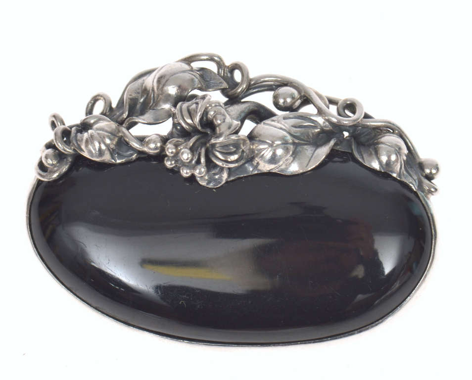 Silver brooch with black agate