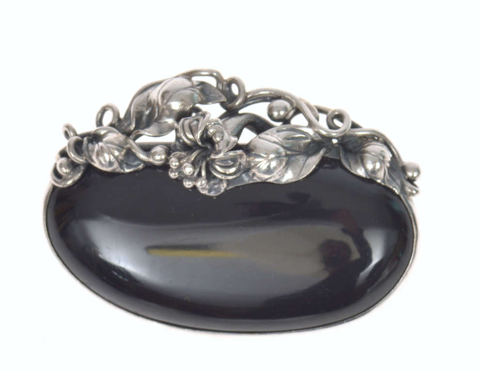 Silver brooch with black agate