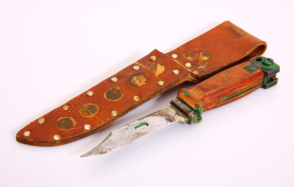 A dagger made Stiletto in the original leather frame