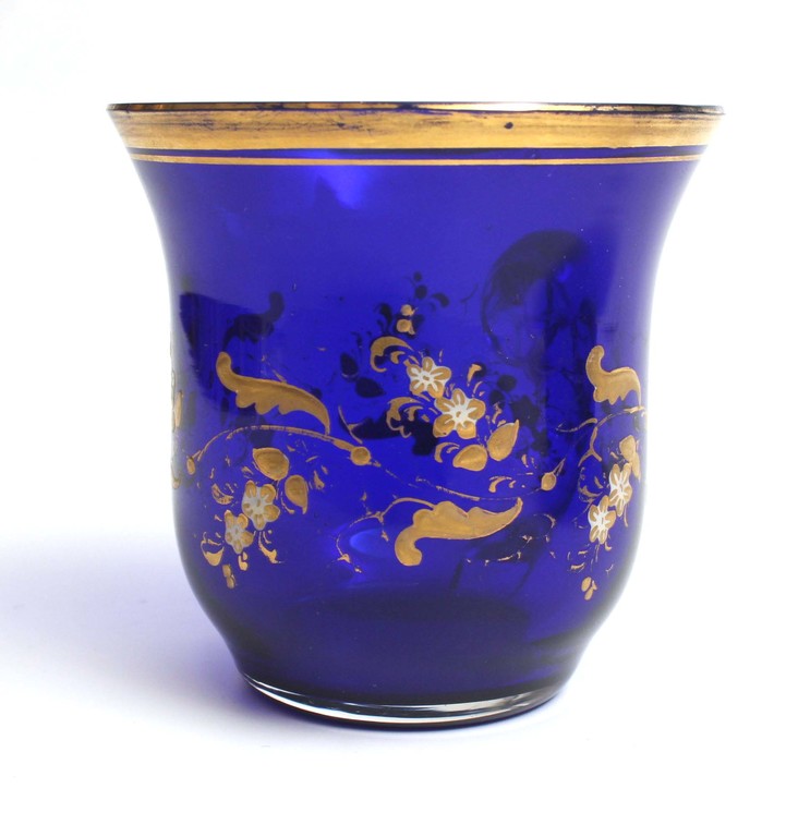 Blue glass cup with saucer
