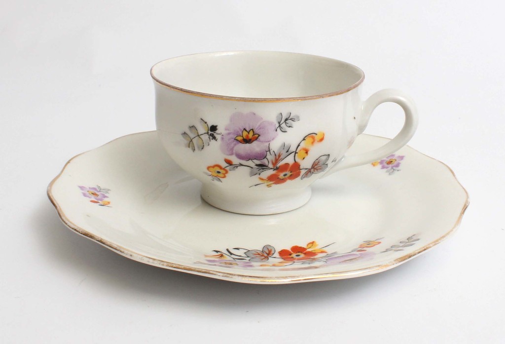 Porcelain cup with saucer