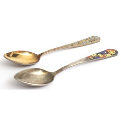 Two silver spoons with enamel
