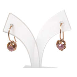 Gold earrings with pink stone