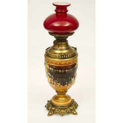 Empire style lamp with a red dome