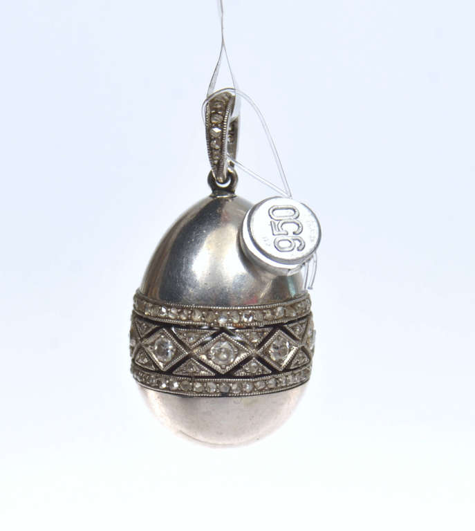 Platinum pendant in the shape of an egg with diamonds