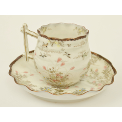 Porcelain cup with saucer