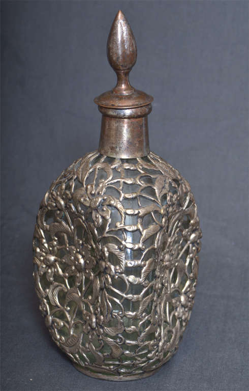Glass decanter with metal finish
