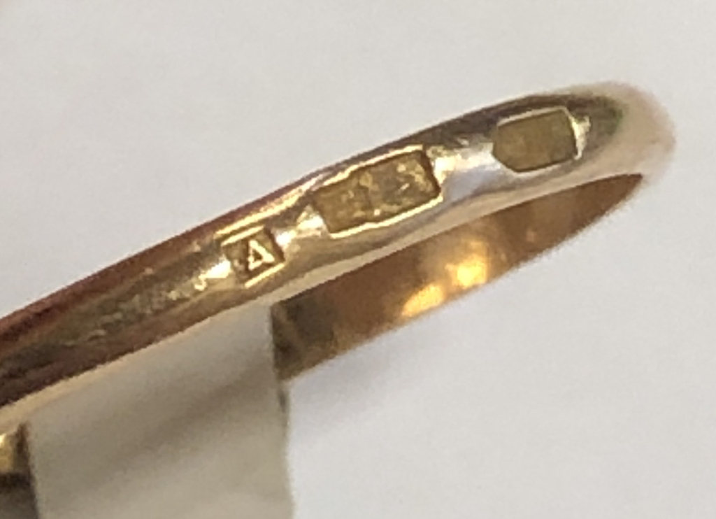 Gold ring with a diamond