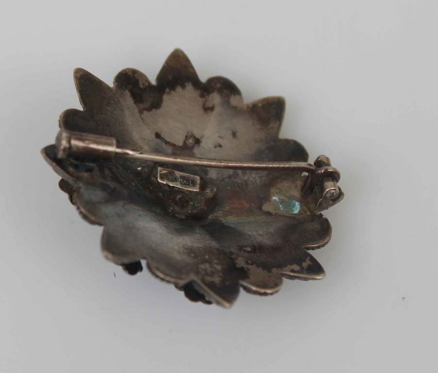 Silver brooch with turquoise