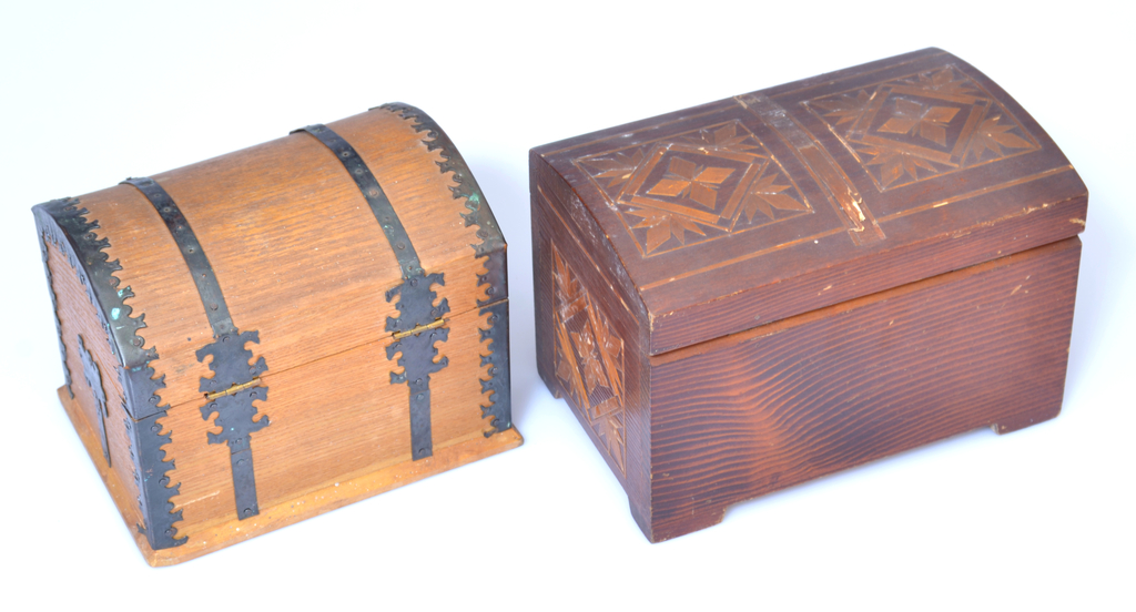 2 wooden chests with decorations