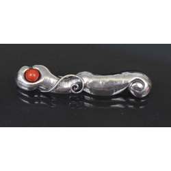 Silver Art Nouveau brooch with red coral