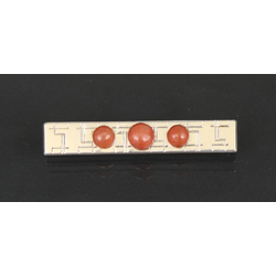 Silver Art Nouveau brooch with red coral
