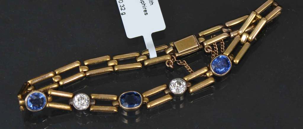 K. Faberge gold bracelet with sapphires and diamonds