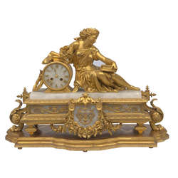 Позолоченные бронзовые каминные часы в стиле ампир