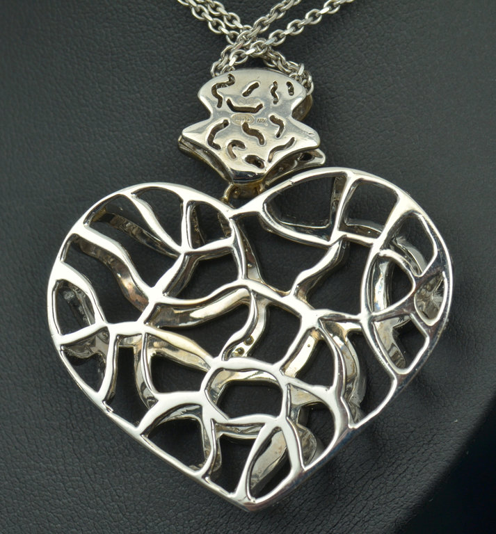 White gold necklace with diamonds and heart-shaped pendant