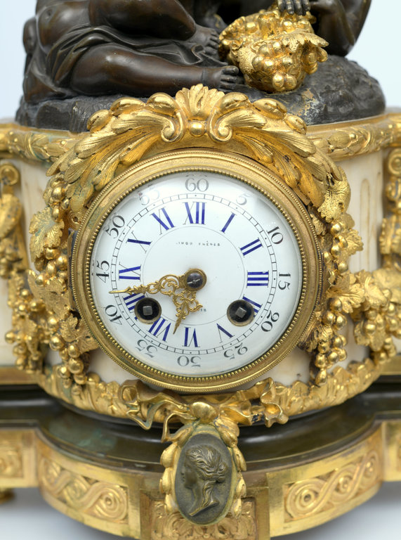 Kаминные часы из позолоченной бронзы