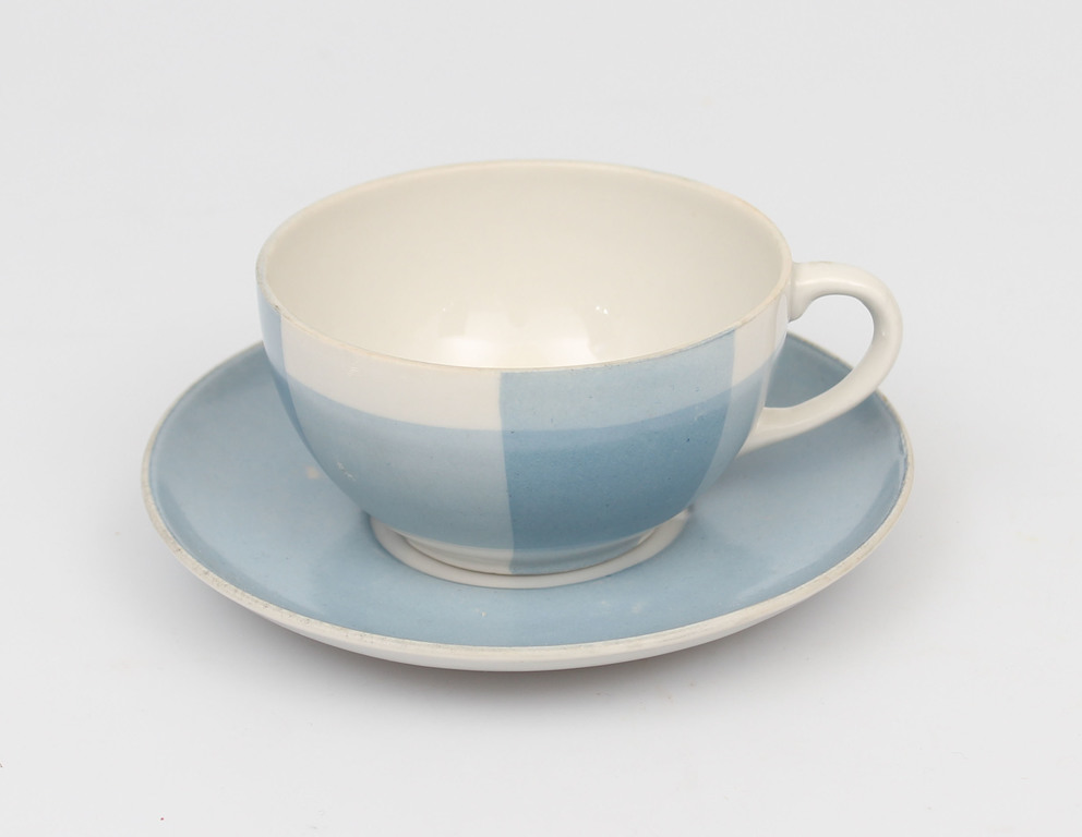 Porcelain cup with saucer