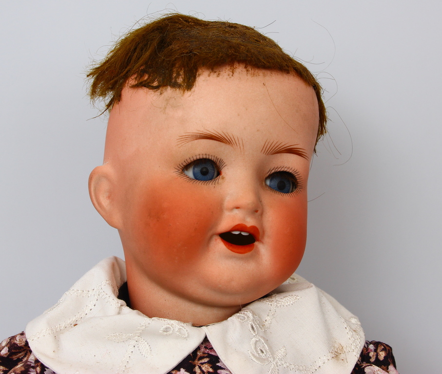 Doll with a porcelain head