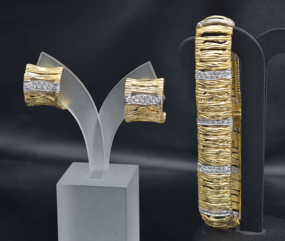 Gold bracelet and earrings with diamonds