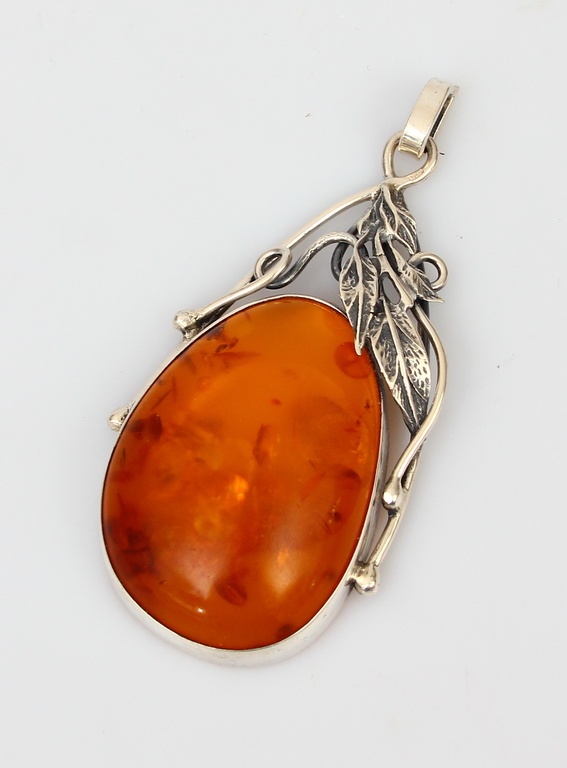 Silver Art Nouveau pendant with amber