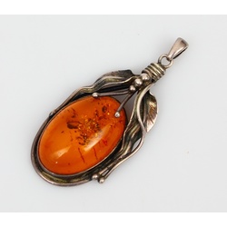 Silver Art Nouveau pendant with amber