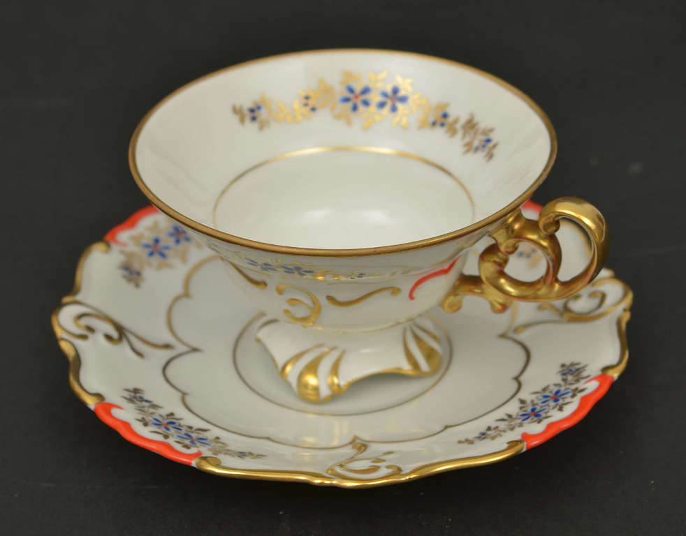 Porcelain cup with saucer