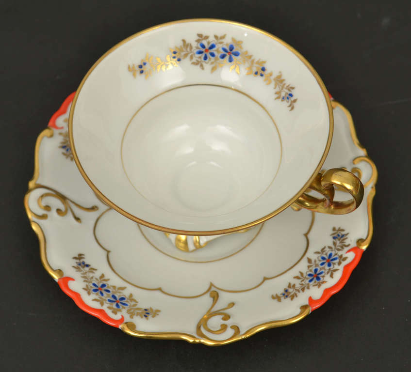 Porcelain cup with saucer