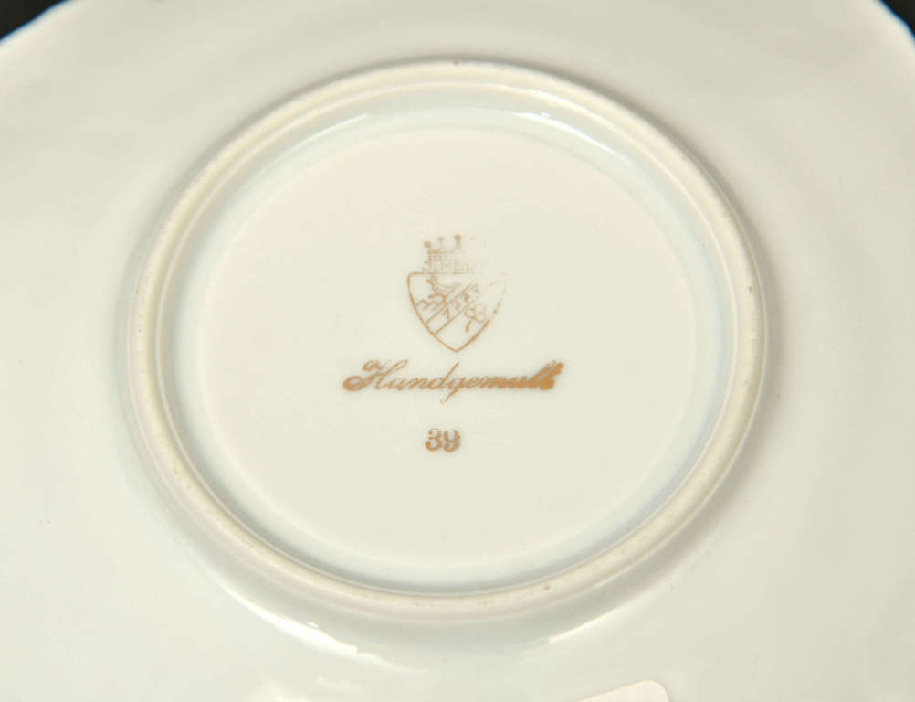 Porcelain cup with saucer