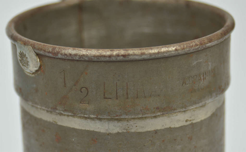 Metal measuring cup with K.Ulman time two hallmarks