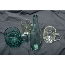 3 beer mugs and an Aldaris glass bottle