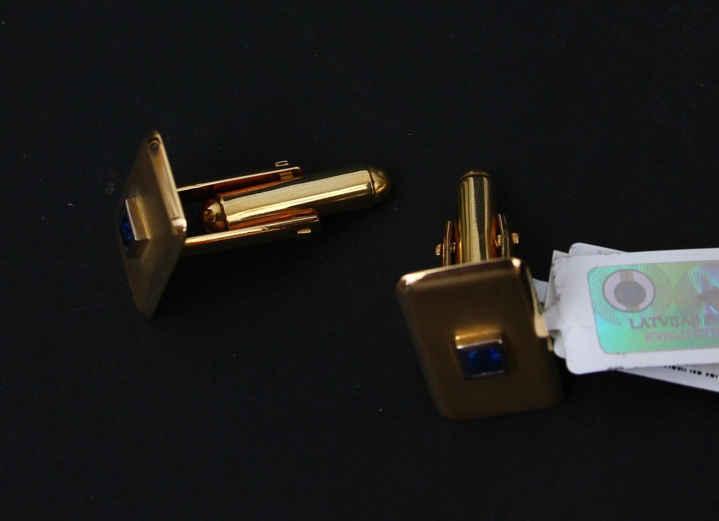 Gold cufflinks with sapphires