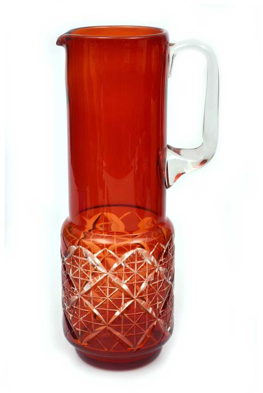 Colored glass pitcher of Ilguciems juice
