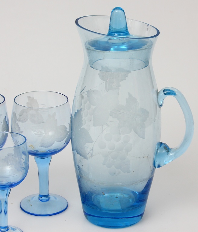 Blue glass decanter with four glasses