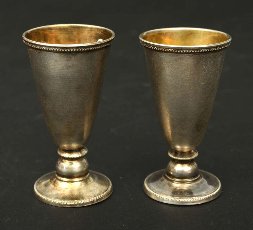 Two silver glasses with gilding inside