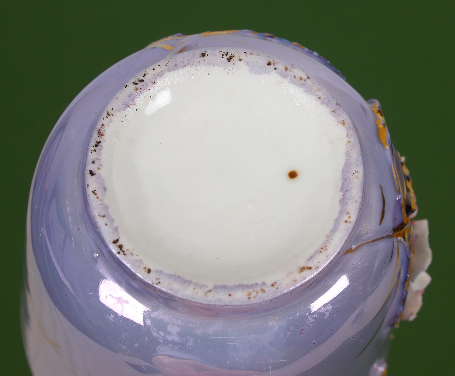 Porcelain cup with flowers